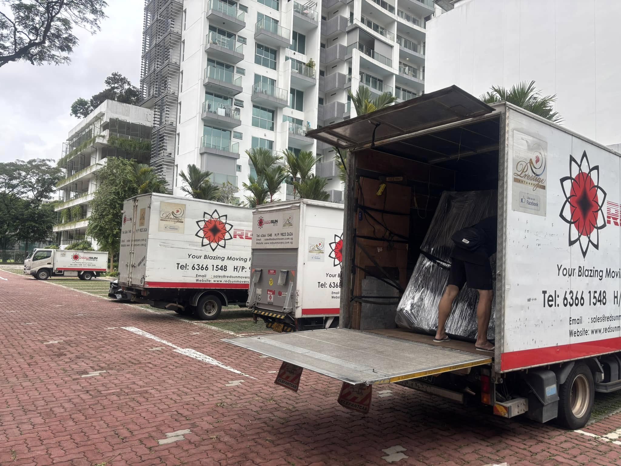 Professional movers loading a truck in Jurong Singapore.